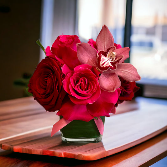 Red and Hot Pink Roses + Orchid